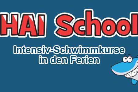 Logo der HAI School mit dem Slogan „Intensiv-Schwimmkurse in den Ferien“ und einem lächelnden Hai.