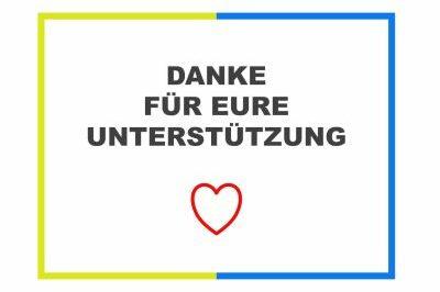 Weiße Karte mit buntem Rahmen, schwarzer Schrift: „DANKE FÜR EURE UNTERSTÜTZUNG“ und rotem Herzsymbol.