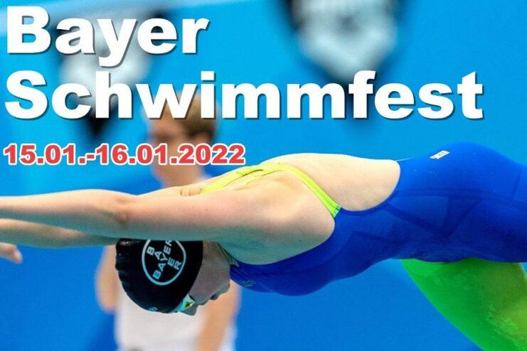 Sprinterin in blauer Badebekleidung springt vom Startblock ins Wasser beim Bayer Schwimmfest 2022.